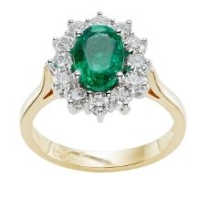 Gold Emerald gemstone platinum Halo engagement ring in hatton garden