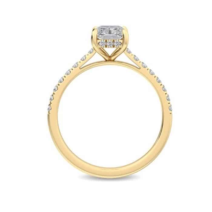 Radiant cut diamond shoulder hidden halo engagement ring by the Diamond Ring Company yellow gold front view