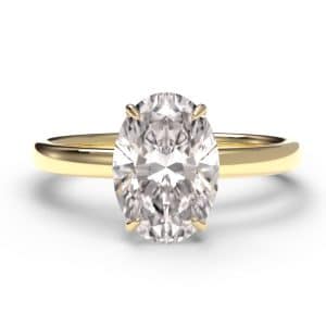 Oval cut hidden halo diamond engagement ring in yellow gold – birds eye view