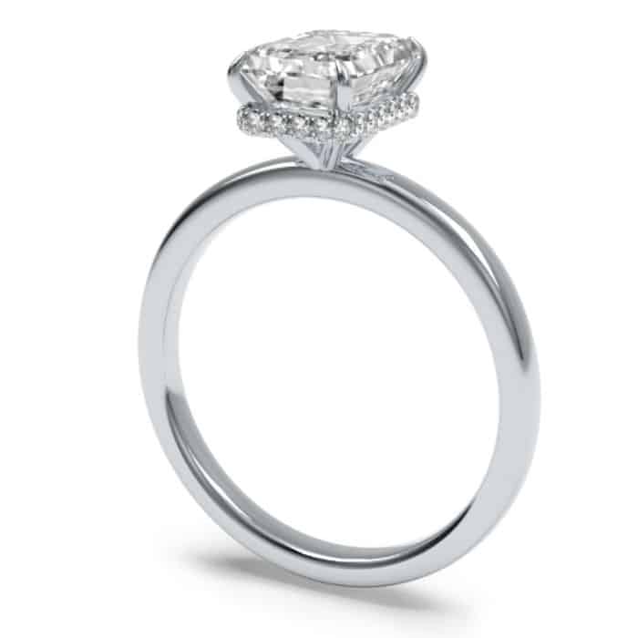 Radiant cut hidden halo diamond engagement ring in platinum