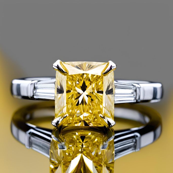 Cushion Cut Yellow Diamond ring with tapered bauguettes